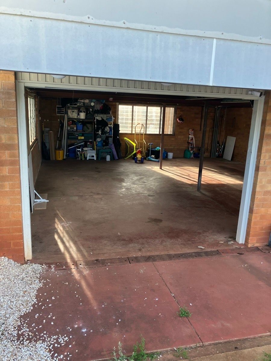 in progress Basalt Colorbond Steel Sectional Door – PD Impact, Centenary Heights