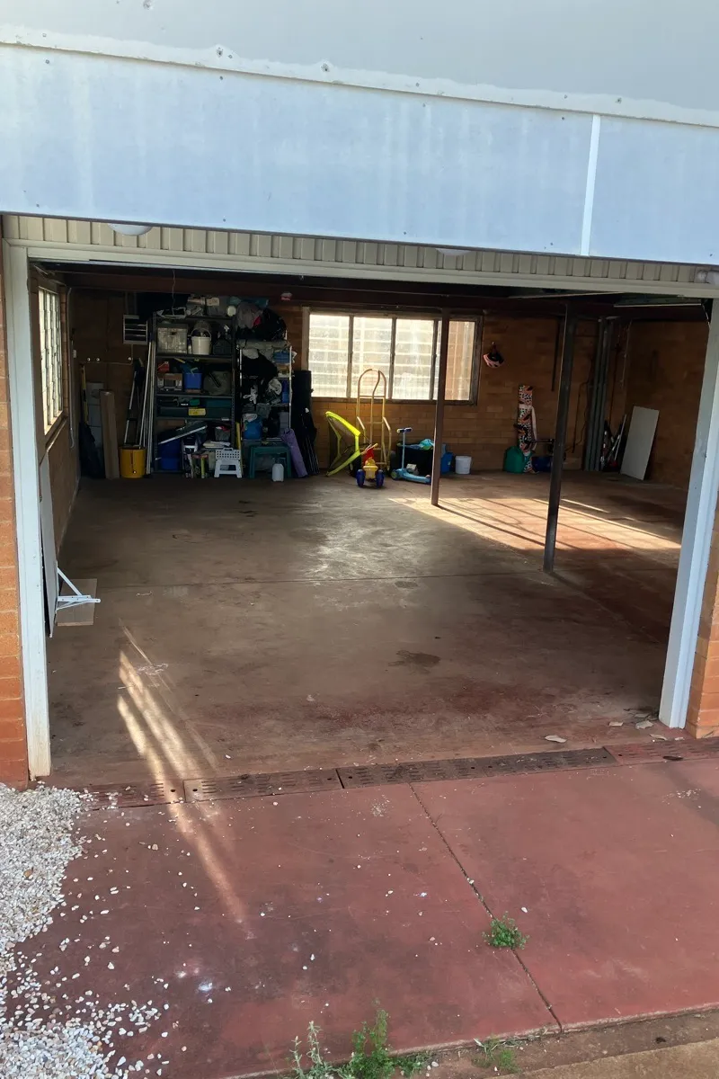 in progress Basalt Colorbond Steel Sectional Door – PD Impact, Centenary Heights